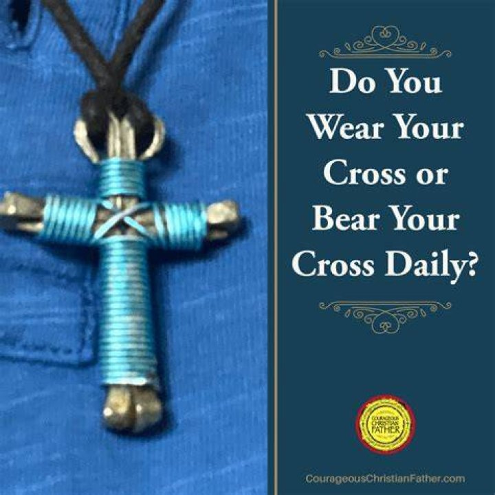 Can you wear a cross on your dog tags?